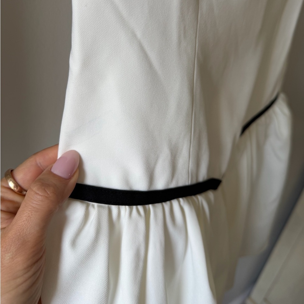 Sleeveless White Mini Dress with Black Trim - Picture 6 of 12